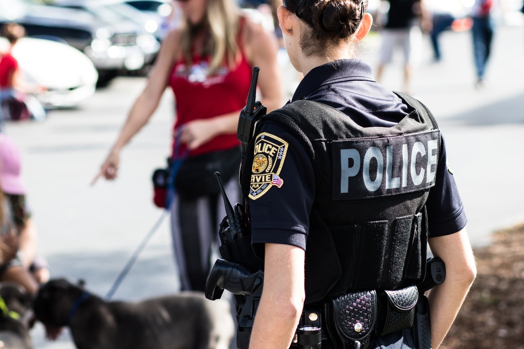 Female police officer at a building security incident