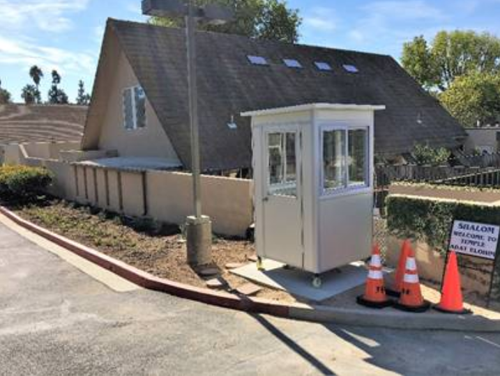 A small guard booth outside a neighborhood entryway