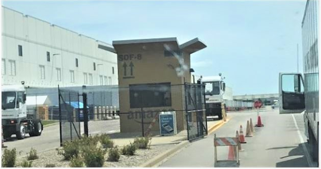 Guard booth shaped as open Amazon box