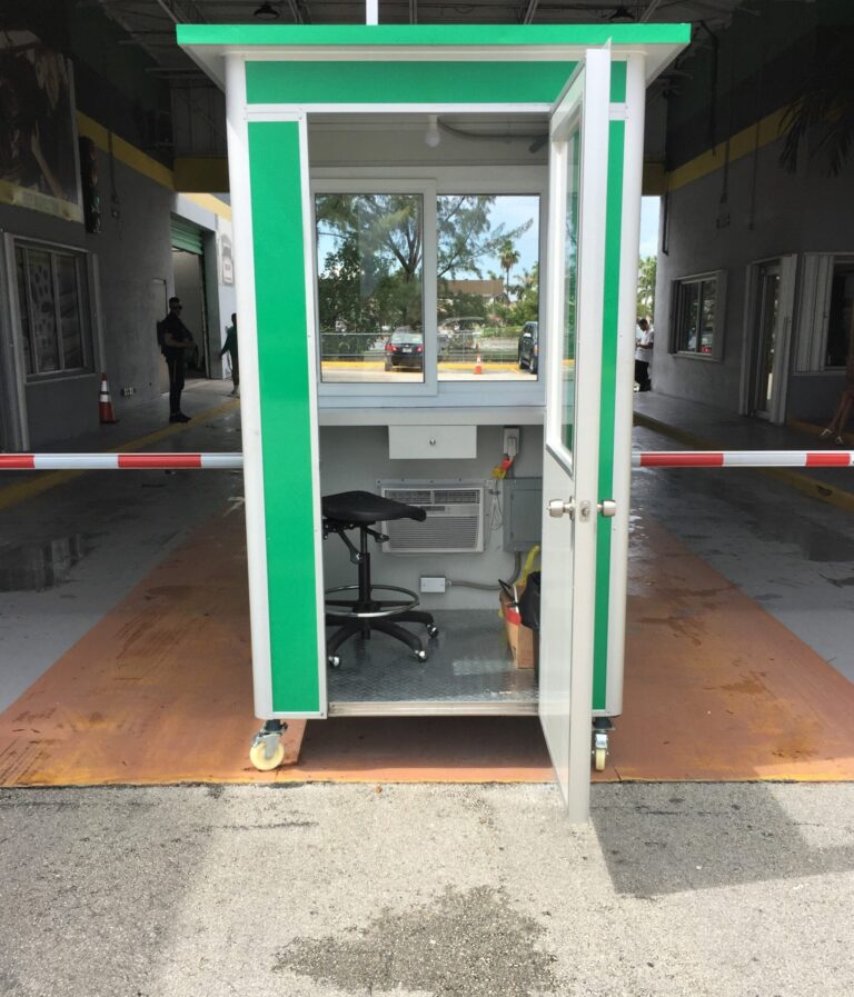 4x4 Parking Booth in Doral, Fl Outside a Car Dealership with Built-in AC, Breaker Panel Box, and Sliding Windows