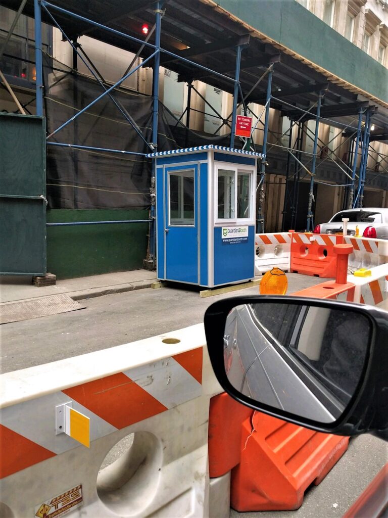 4x4 Security Guard Booth in Manhattan, NY with a Swing Door, Sliding Windows, and Anchoring Brackets