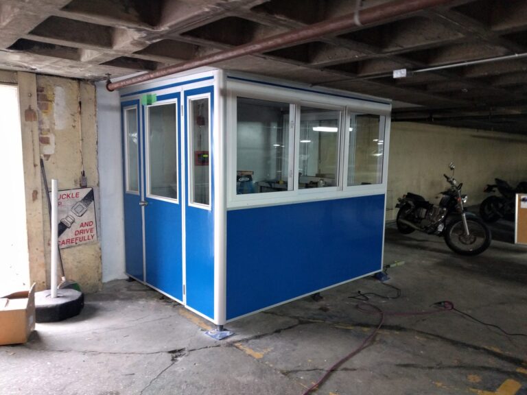 6x8 Parking Booth in Fort Lee, NJ in a Parking Garage with Built-in AC, Baseboard Heaters, and Ethernet Port and Phone