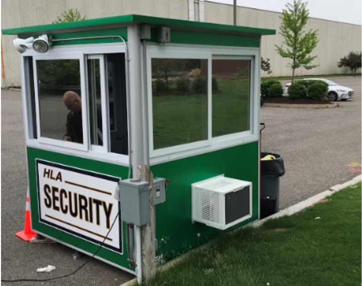 A green guard booth with 