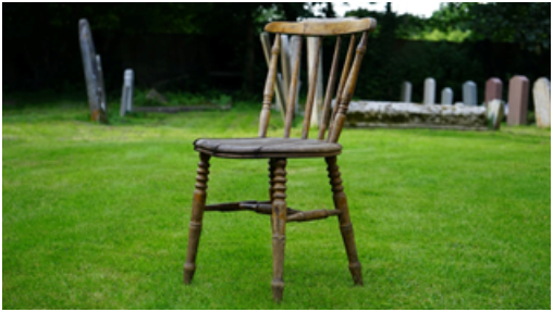 An old chair on a lawn