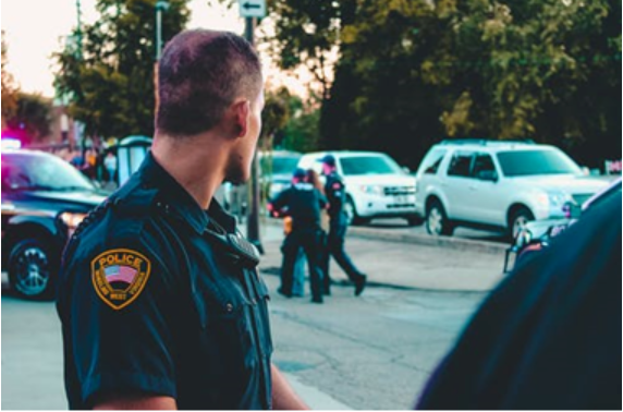 A police officer in blue uniform