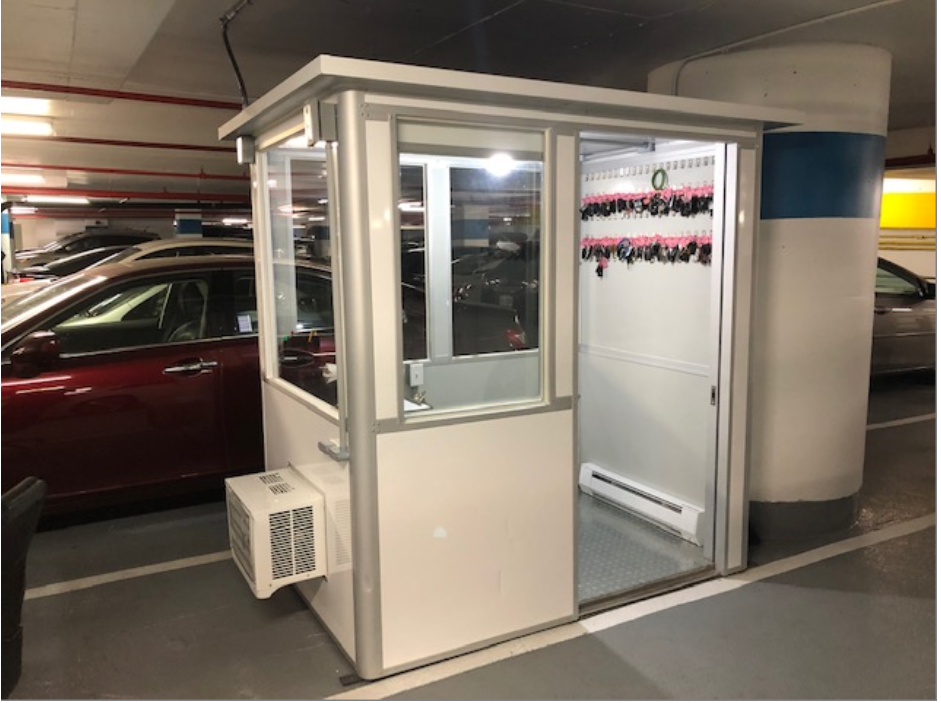 Parking booth with open door