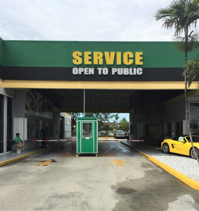 4x4 Parking Booth in Doral, Fl Outside A Car Dealership with Custom Exterior Color, Swing Door, and Caster Wheels