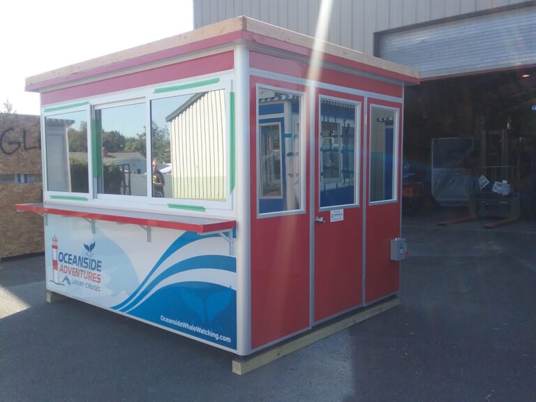 8x10 Ticket Booth in Oceanside, CA with Custom Graphics, Tinted Windows, Anchoring Brackets, and Ethernet and Phone Line