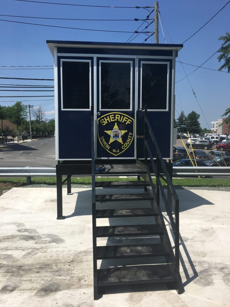 8x8 Security Guard Booth in Elizabeth, NJ with Mezzanine, Swing Door, Custom Exterior Color, and Breaker Panel Box