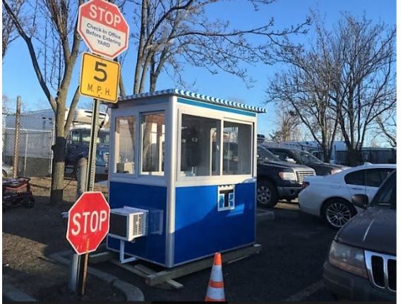 Parking lot with blue parking booth-n