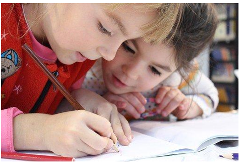 Two kids studying