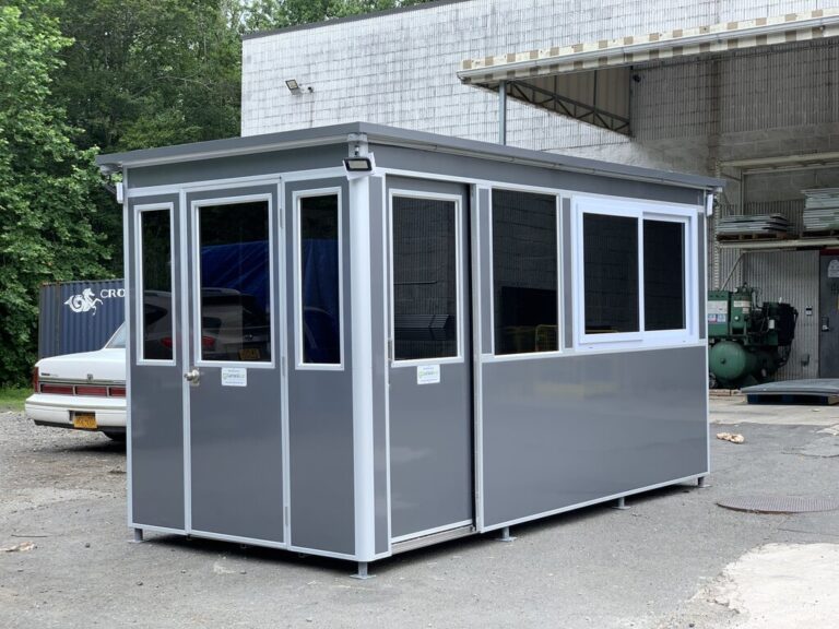 7x14 Construction Site Booth in Franklin IN with Sliding Door with Fixed Window, Tinted Windows, Custom Vinyl Wrap, Outside Spotlights, Exterior Panel Box, Anchoring Brackets 1