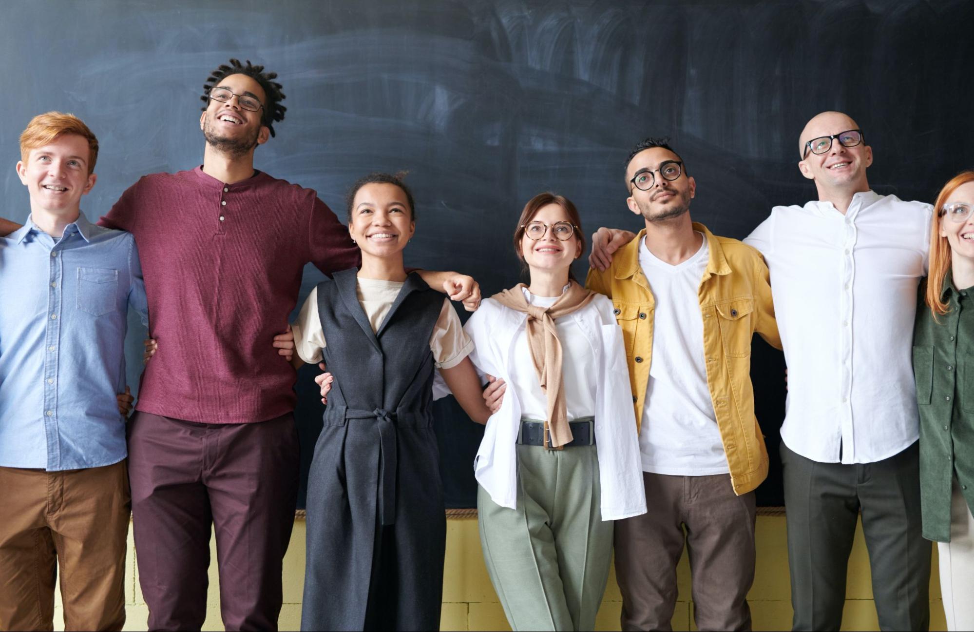 happy employees standing in row