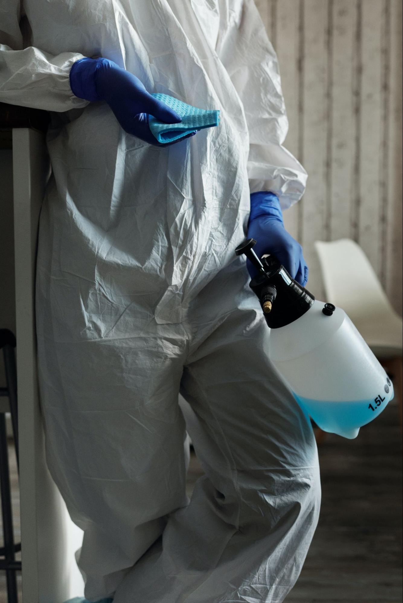 worker wearing PPE to handle chemicals