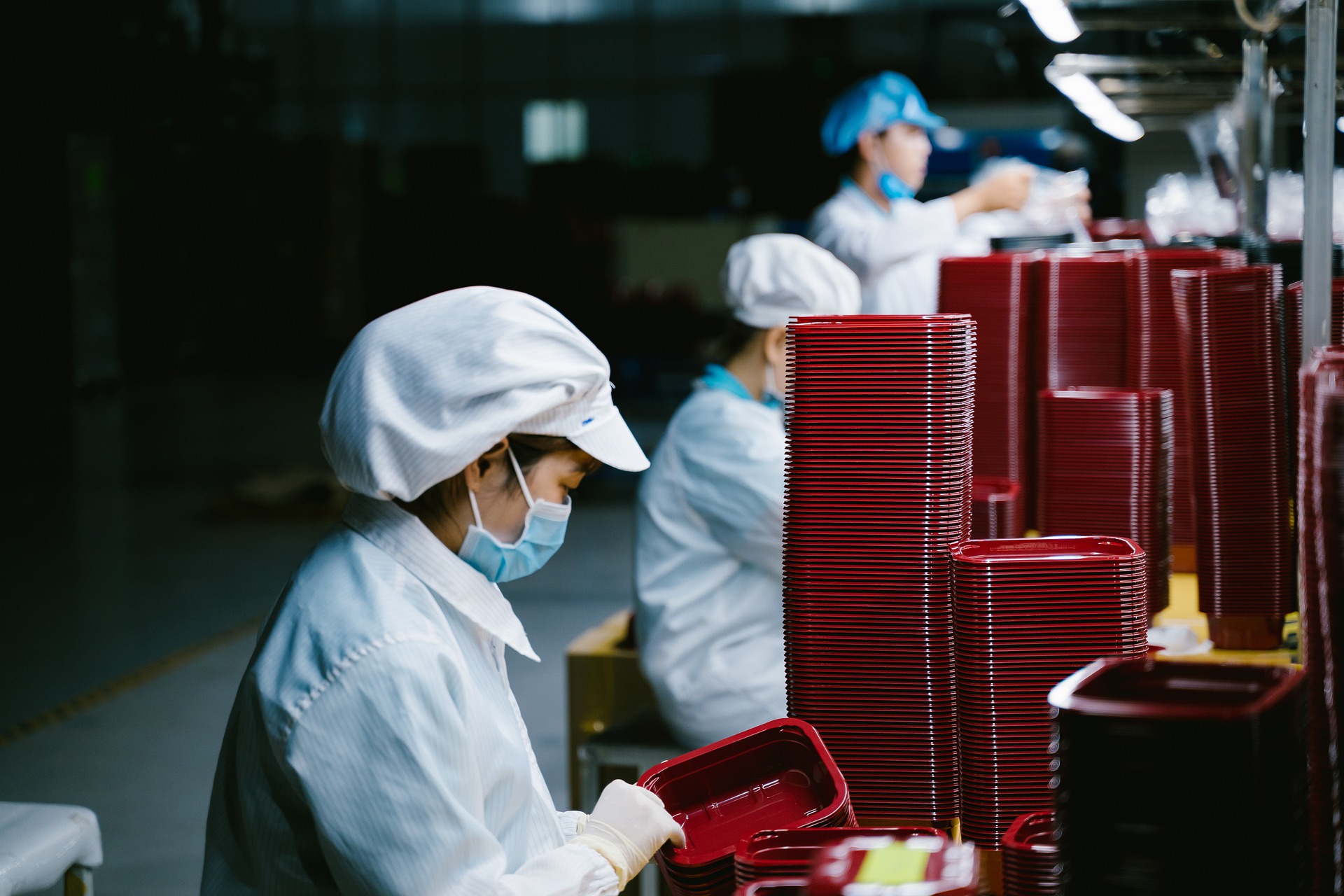 workers in manufacturing facility