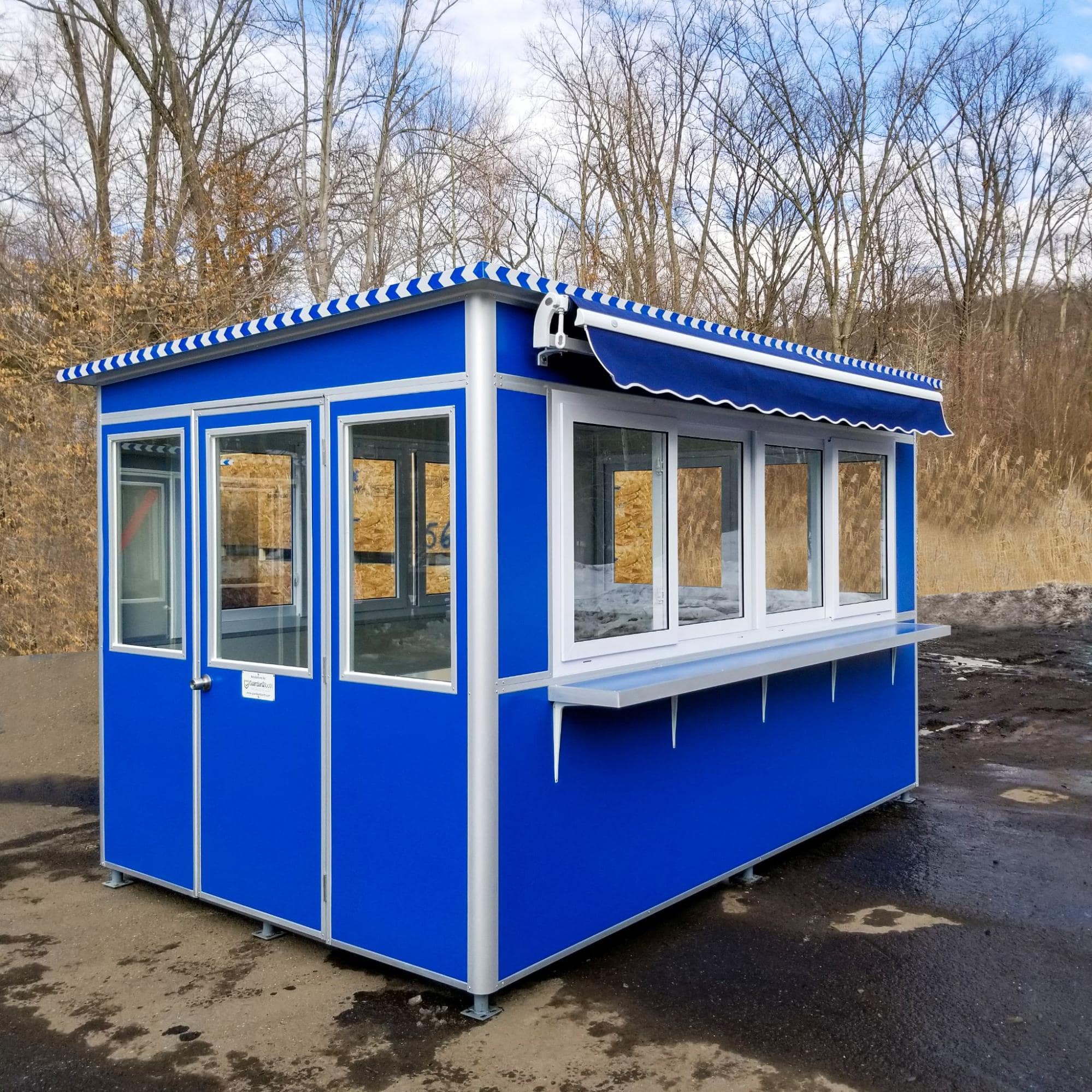 A large modular booth with awnings and a customer service counter