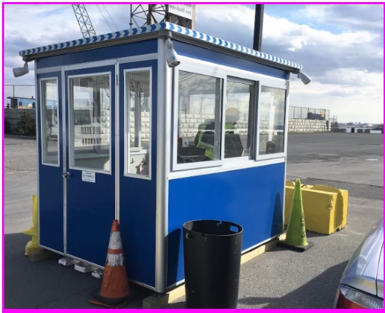 Blue security booth in a parking lot
