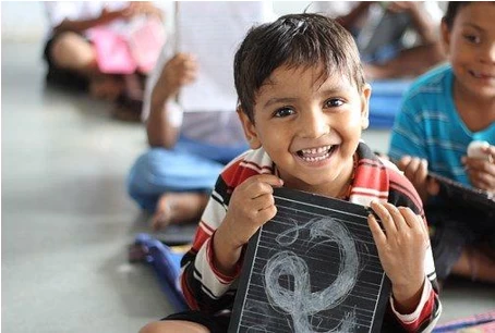 Smiling boy in school
