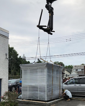 crane dropping of premanufactured booths for construction delivery and installation